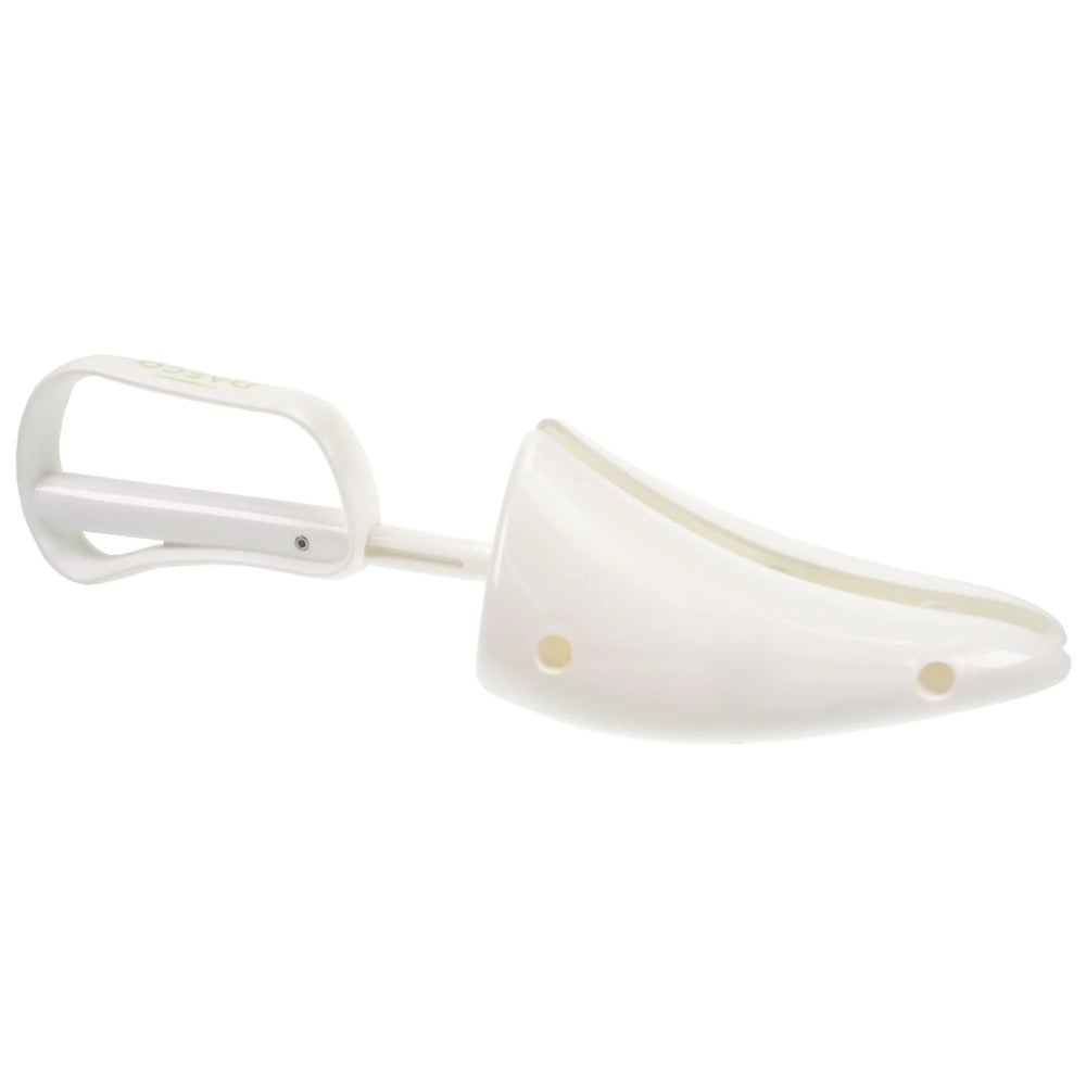 White kitchen mixer beater on a plain background