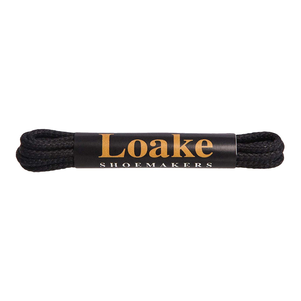 Black shoelaces with Loake Shoemakers label on a white background