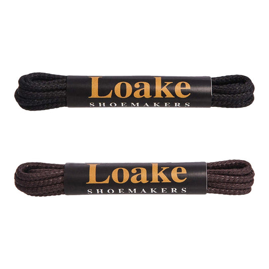 Two pairs of black shoelaces with Loake Shoemakers packaging on a white background