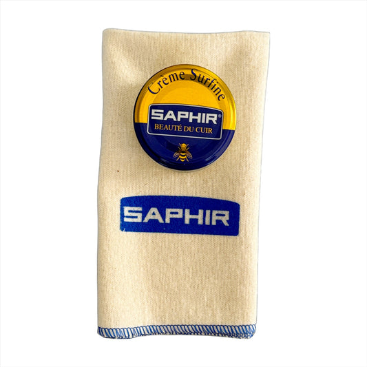Saphir leather care product with cream container on a white background
