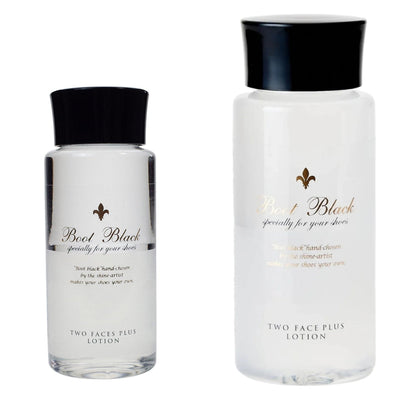 Two bottles of Boot Black Two Faces Plus Lotion for leather care, one in a smaller size and another in a larger size, both with white labels and black caps.