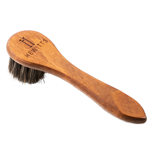 A wooden horsehair application brush with round handle and synthetic bristles, branded with 'Hewitts'.